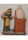 Statuina cm 20 donna al forno per presepe in terracotta dipinta a mano