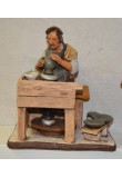 Statuina tornitore con banco tornio e vasi per presepe cm 30 in terracotta decorata a mano