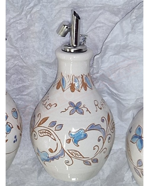 Oliera con decoro rampicante con fiori campanelle azzurri con scritta Rapallo