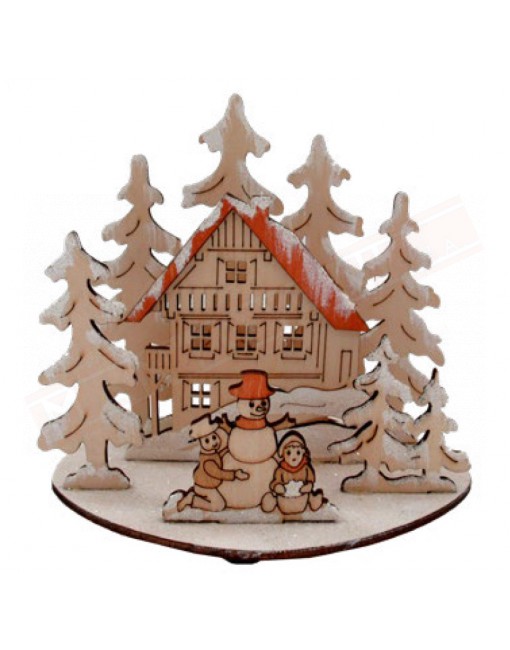 Paesaggio di natale in legno intagliato con alberi casetta e pupazzo di neve