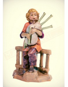 Fontanini ragazzo seduto su steccato con cornamusa adatto per statuine del presepio da cm 12